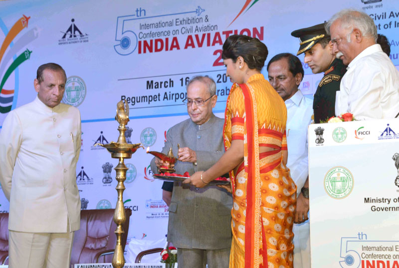 The President, Mr. Pranab Mukherjee lighting the lamp to inaugurate the 5th Edition of Binennial Aviation Event on the theme ‘India’s Civil Aviation Sector: Potential a Global Manufacturing & MRO Hub’, at Hyderabad on March 16, 2016. The Governor of Andhra Pradesh and Telangana, Mr. E.S.L. Narasimhan the Union Minister for Civil Aviation, Mr. Ashok Gajapathi Raju Pusapati and the Chief Minister of Telangana, Mr. K. Chandrashekar Rao are also seen.