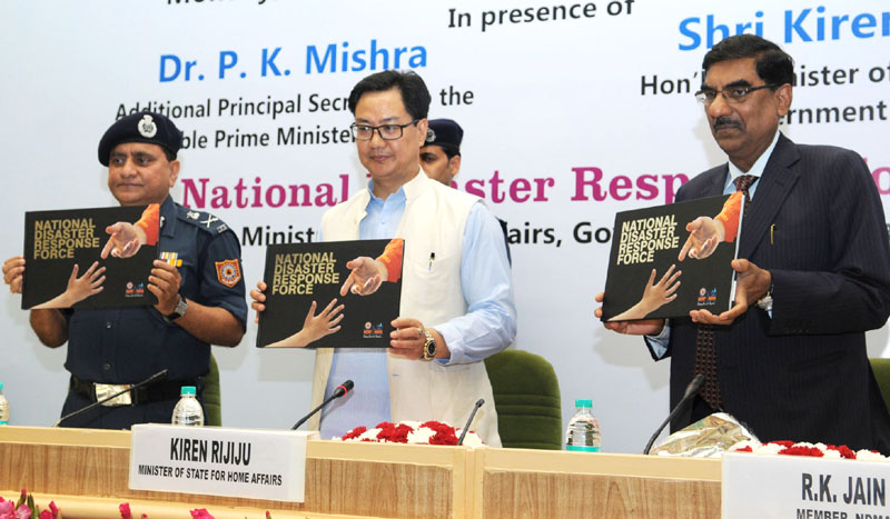 The Minister of State for Home Affairs, Mr. Kiren Rijiju releasing the brochure at the valedictory function of the National Workshop on ‘Strengthening National Response Capabilities’, organised by the NDRF, in New Delhi on March 07, 2016. The Director General, National Disaster Response Force (NDRF), Mr. O.P. Singh is also seen.