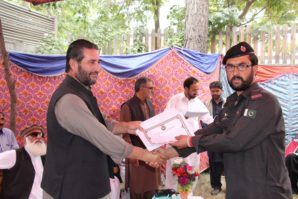 CHITRAL:   District Nazim Maghfirat Shah  giving away certificate to participant of training on the eve of  6 days training workshop on capacity building  of wild life staff and community representatives in rules and Regulation  under KP wildlife and Biodiversity Act 2015  photos by Gul Hamad Farooqi